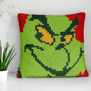 Grinch Pillow Cover Crochet Pattern C2C adds a mischievous twist to holiday decorating, featuring the classic villain's green face for a DIY Christmas gift.